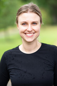 Portrait of beautiful smiling blonde young woman 