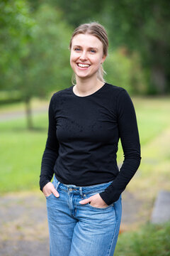 Portrait of beautiful smiling blonde young woman 