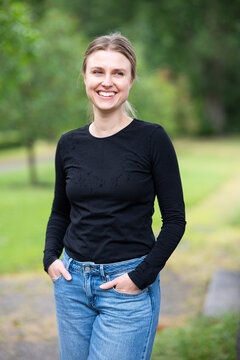 Portrait of beautiful smiling blonde young woman 