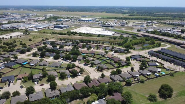 Clustered cul de sac streets branch across Hillery Heights community within Fort Worth suburbs. Fenced backyards showcase private swimming pools, tidy lawns, solar arrays, Burleson, Texas