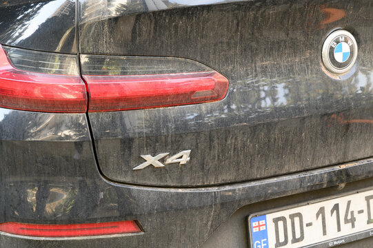  April 2, 2026, Tbilisi, Georgia Rear View of BMW X4 Covered in Mud After Rain