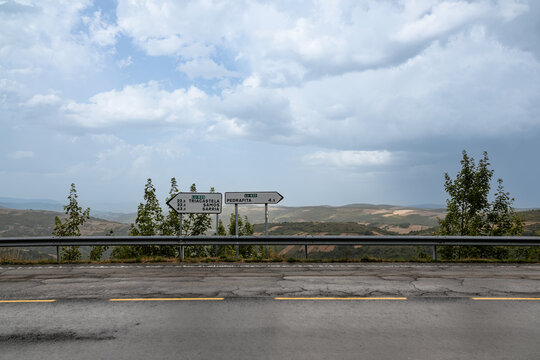 Road signs pointing direction to Triacastela and Pedrafita