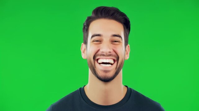 Man laughing joyfully on green screen background with cinematic motion and subtle camera shift