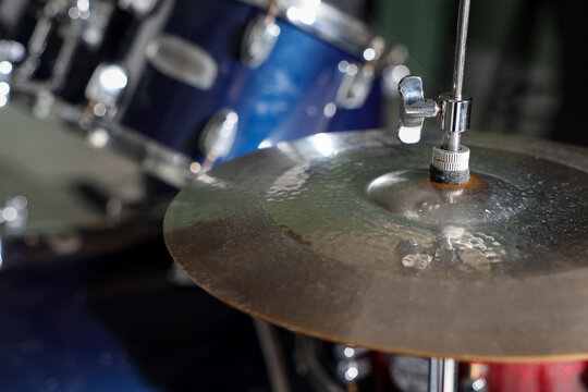 Closeup view of drum set on dark background