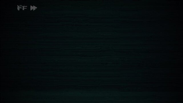 VHS tape FF with white FF text and tracking errors. VCR videocassette recorder animation featuring glitches, artifacts and static TV noise. Retro vintage background or overlay. 4k video