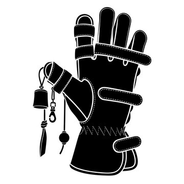 Hand wearing black leather falconry glove holding jesses and bell for trained bird of prey control