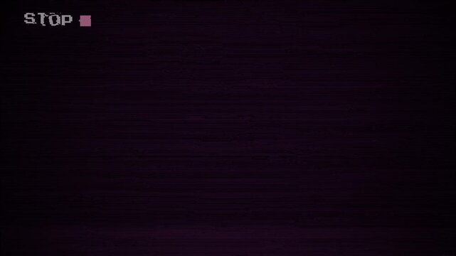 VHS tape STOP on black background  with Retro analog TV. 4K video