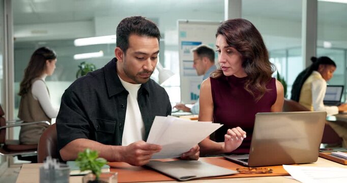 Review, paper and people in office with laptop, expense analysis and feedback on budget report. Discussion, team and finance analyst with document, cost control and evaluation of revenue forecast.