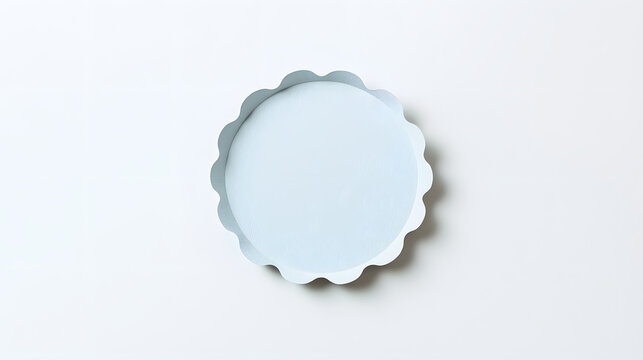 Minimalist blank scalloped-edge round coaster in soft sage green, isolated on a clean white background with a subtle shadow, ideal for product mockups, label design, packaging, and copy space layouts.