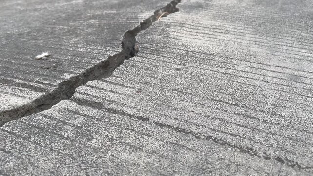 Ruined Public Infrastructure with Severe Concrete Road Damage