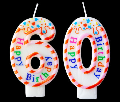 Number sixty shaped birthday candle with colorful sprinkles and Happy Birthday text isolated on a black background