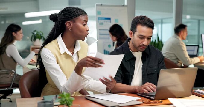 Review, paper and team in agency with laptop, expense analysis and feedback on budget report. Collaboration, people and finance analyst with document, cost control and evaluation of revenue forecast.