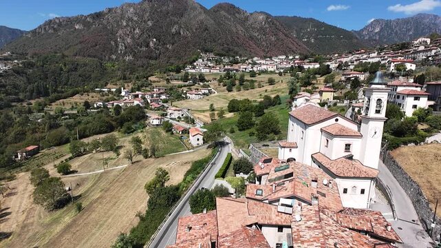 Aerial Drone View of Traditional Italian Mountain Village With Church in the Alps