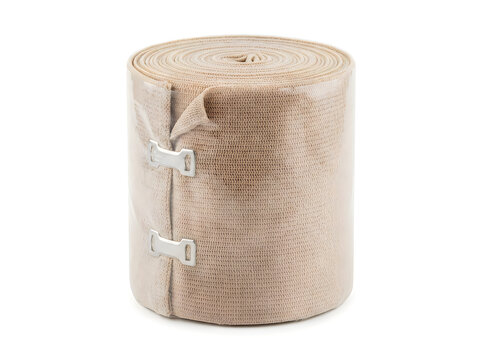 roll of beige elastic medical bandage trauma wound dressing isolated on transparent background