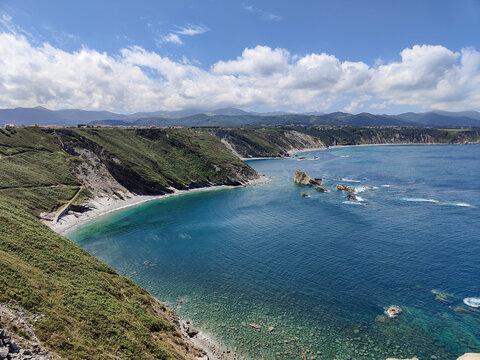 Asturias rocky coastline with sea stacks and clear water
