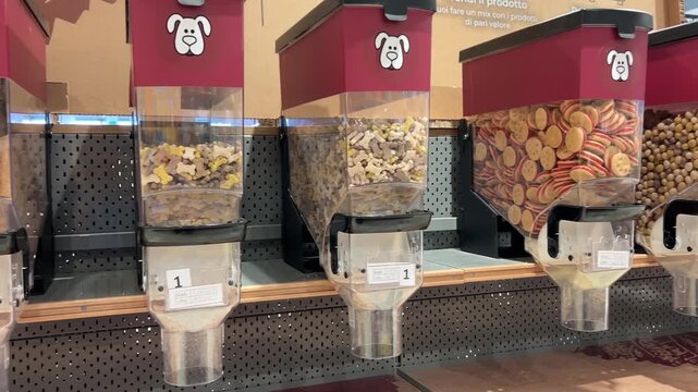 Pet food dispensers in bulk store with variety of dog treats and biscuits, eco friendly o zero waist, package free eco shop.