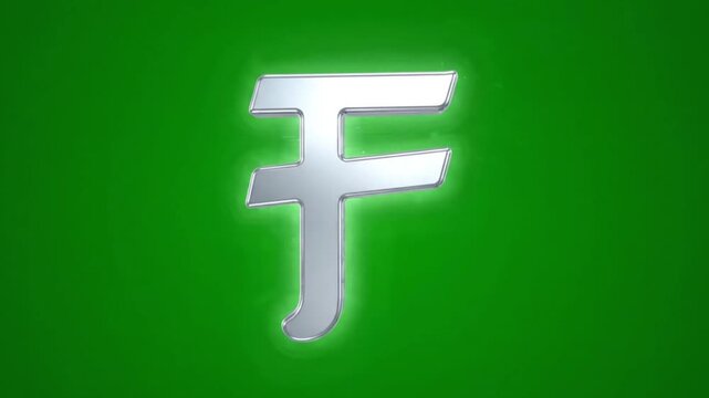 A video showcasing a metallic symbol on a green background with water splashes
