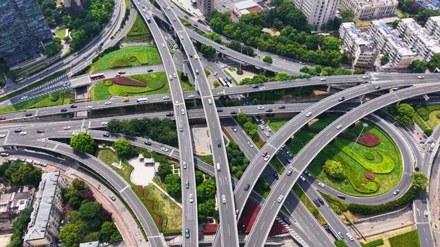 Top‑down aerial view of complex multi‑level urban highway interchange