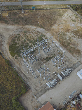 Aerial view of Subestacion O Rosal featuring high-voltage electrical equipment, metal structures, and power lines set within a fenced area in O Rosal, Pontevedra, Spain.