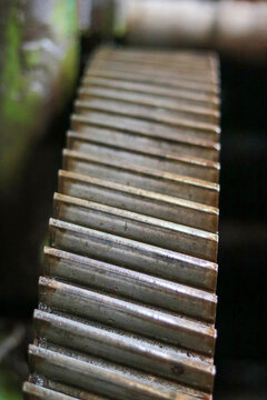 Macro Detail of Large Industrial Metal Gear Teeth and Drive Transmission