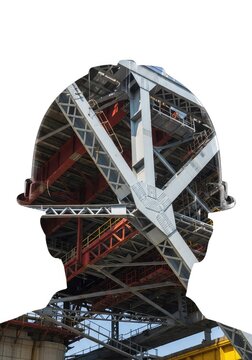 Double exposure merging a protective hard hat silhouette with complex steel girders and framework of a massive bridge under construction, beams, metal structure, construction project
