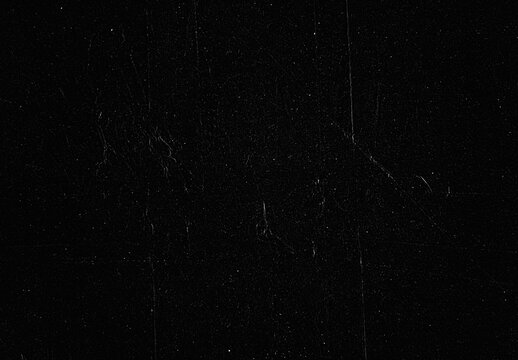 Grunge black paper with delicate scratch detail.Dark paper grain with faint grid lines texture.vintage paper texture background featuring subtle dust specs and fold creases.