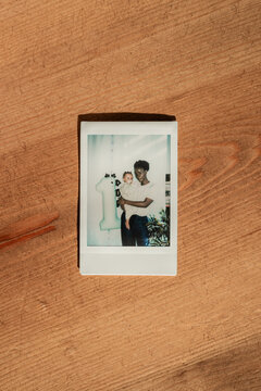 Celebration of First Birthday Memory in Polaroid Photo