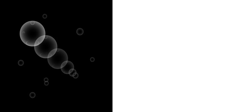 Transparent glowing soap bubbles floating diagonally against black and white