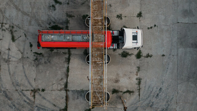 Fuel Truck Beneath Refinery Loading Gantry