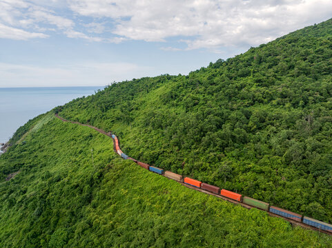 Cargo Train Curving Through Hai Van Pass Coastal Hills