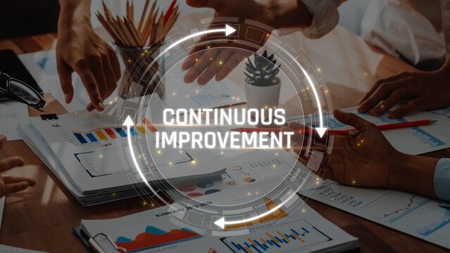 Dynamic Collaboration on Continuous Improvement Strategies in a Modern Office Setting with Various Documents and Creative Elements Sigmoid