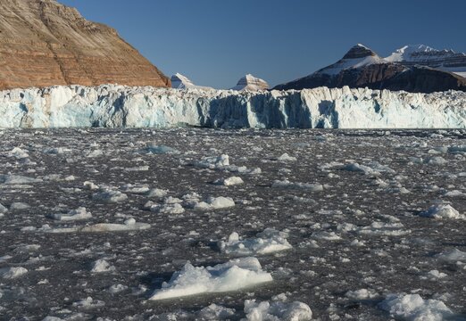 Glacial ice, Ossian Sarsfjellet, Colletthogda, two of the three mountains known as Tee Kroner (Three Crowns), Kronebreen or Kronengletscher Glacier, Kongsfjord or Kongsfjorden, the Svalbard archipelago, Svalbard, Norway