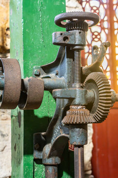 Vintage industrial gear mechanism with weathered metal components