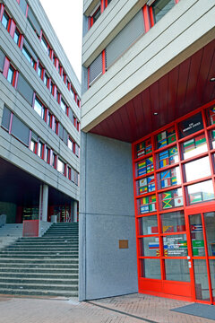 Geneva, Switzerland, Europe :  Headquarters of International Organization for Migration (IOM) a United Nations agency, flags of IOM member states behind the glass