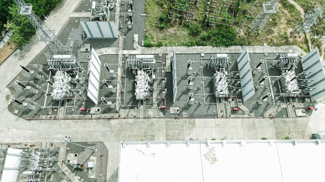 Aerial view of the electrical substation in Tharamani featuring industrial transformers, switchgear, and power infrastructure surrounded by concrete pathways in Chennai, Tamil Nadu, India.
