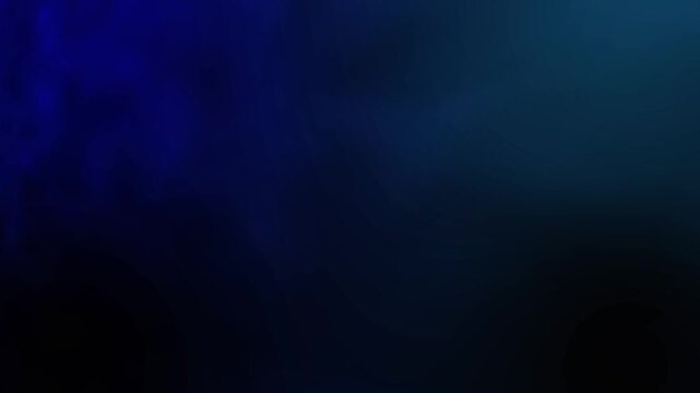 Dark abstract video loop featuring smooth blue and cyan smoke waves, atmospheric fog, and glowing light movement for ambient video backdrops.