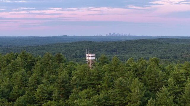 Sunset Aerial View of Snow Hill with the Boston Skyline in Dover Massachusetts