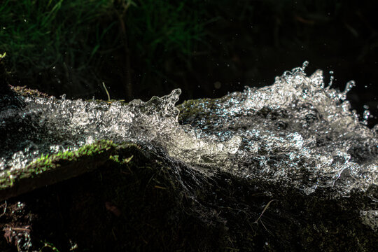 Waterfall splash macro. Water texture background. Fresh liquid motion. Frozen droplet spray. Cascading stream foam. High speed aqua shot. Dynamic wave action. Pure fluid splash. Crystal clear droplets