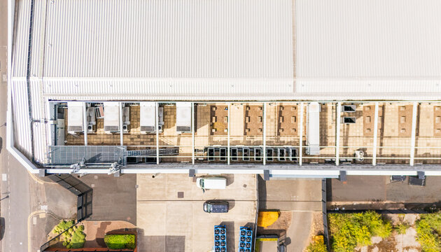 Top down drone view of the HVAC cooling system of a modern data centre with pre-built, steel framework bays ready for future infrastructure expansion and scalability