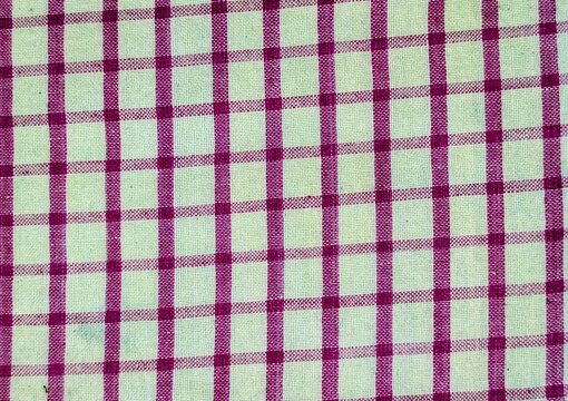 Seamless fabric texture with purple and white checkered pattern