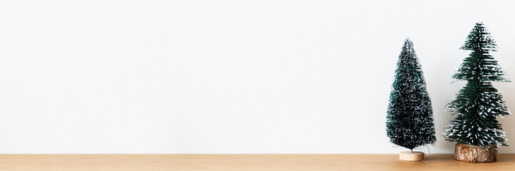Fototapeta premium Mini Christmas trees white banner background
