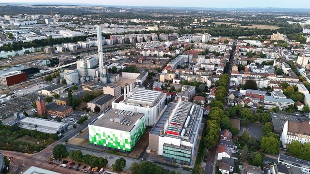 Aerial view of Keppel Data Center Reit featuring modern industrial architecture, surrounding buildings, and green trees in the urban landscape of Offenbach am Main, Hessen, Germany.