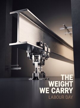 Robotic arm lifting heavy steel beam in industrial workshop setting with responsibility manufacturing
