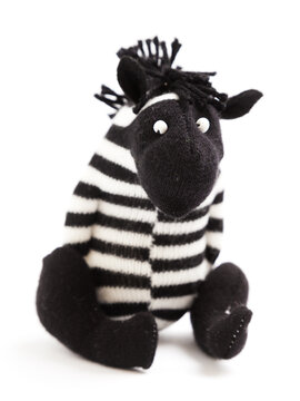 Zebra sock toy isolated on white background
