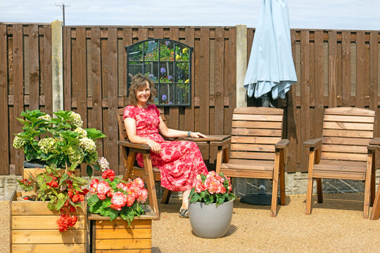 Lady in a red floral dress.