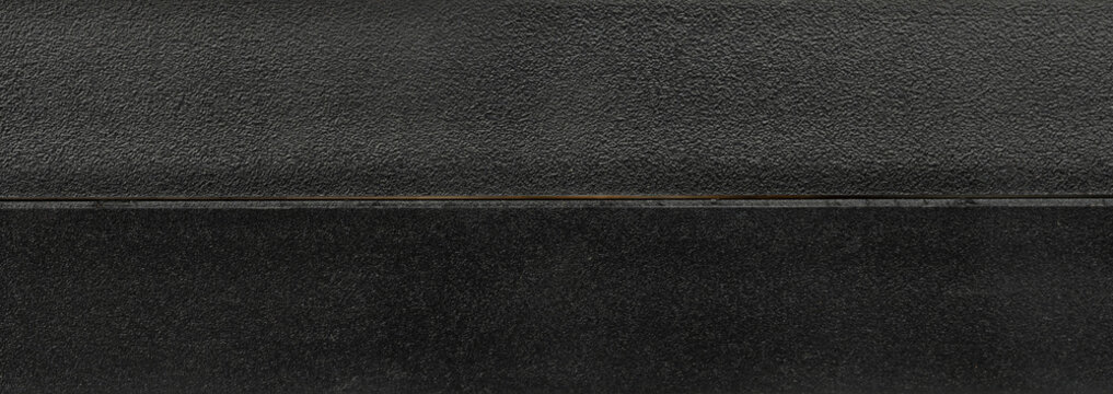 Rough black plastic texture surface