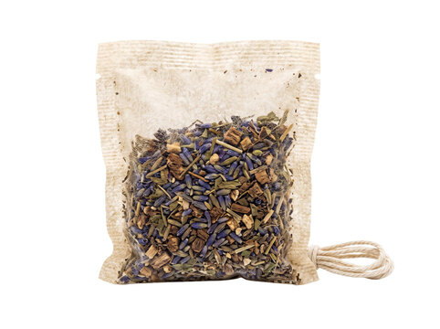 Herbal tea bag lavender blend filled with organic dried herbs for wellness, relaxation, and healthy lifestyle, isolated on black background for beverage packaging mockup design and natural health cont