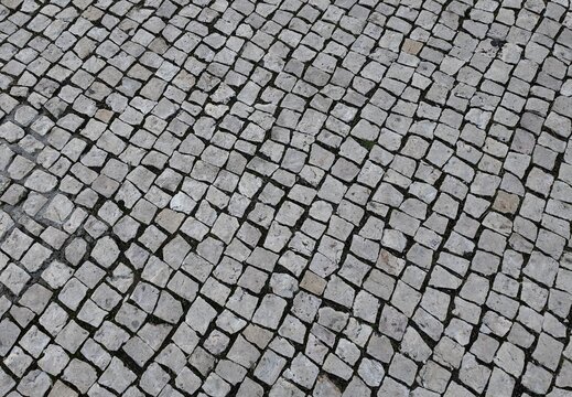 Traditional black and white Portuguese cobblestone pavement pattern