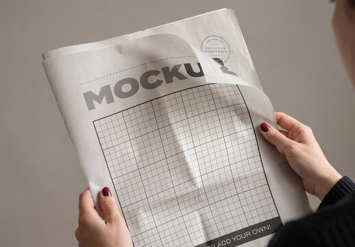 Person Reading Newspaper Cover Mockup