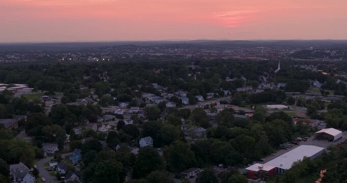 Sunset Aerial View of North Andover with Lawrence Skyline in Massachusetts